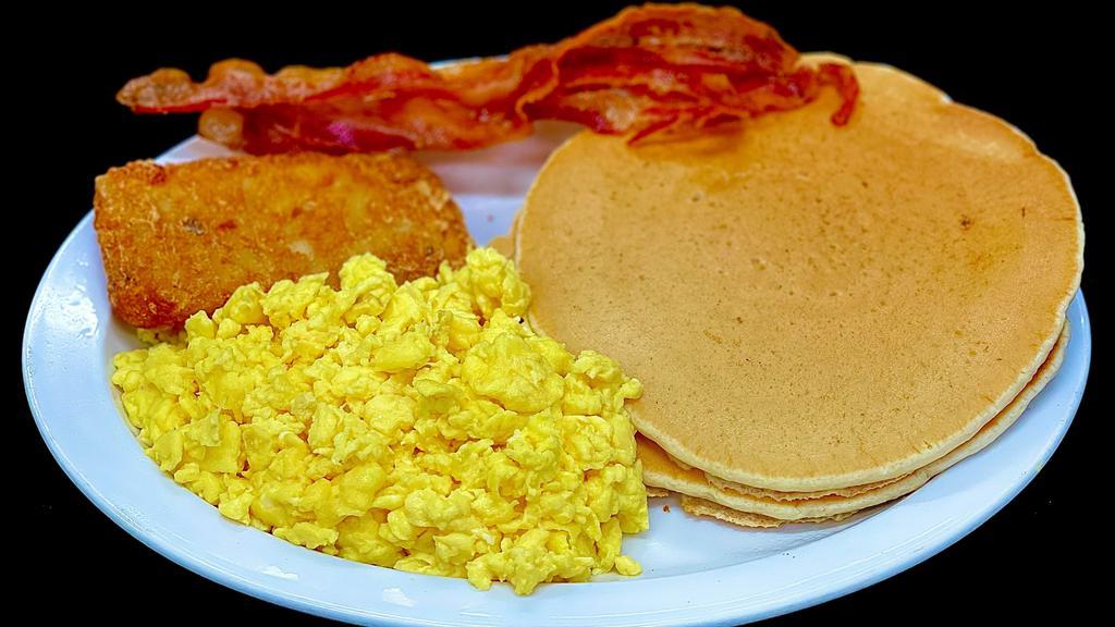 Mathis Big Breakfast · Two eggs, two pancakes, two bacon or (1) sausage and hash browns.