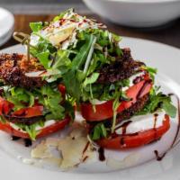 Caprese · Served with Bufala mozzarella, basil, aged balsamic, and extra virgin olive oil. Add crispy ...