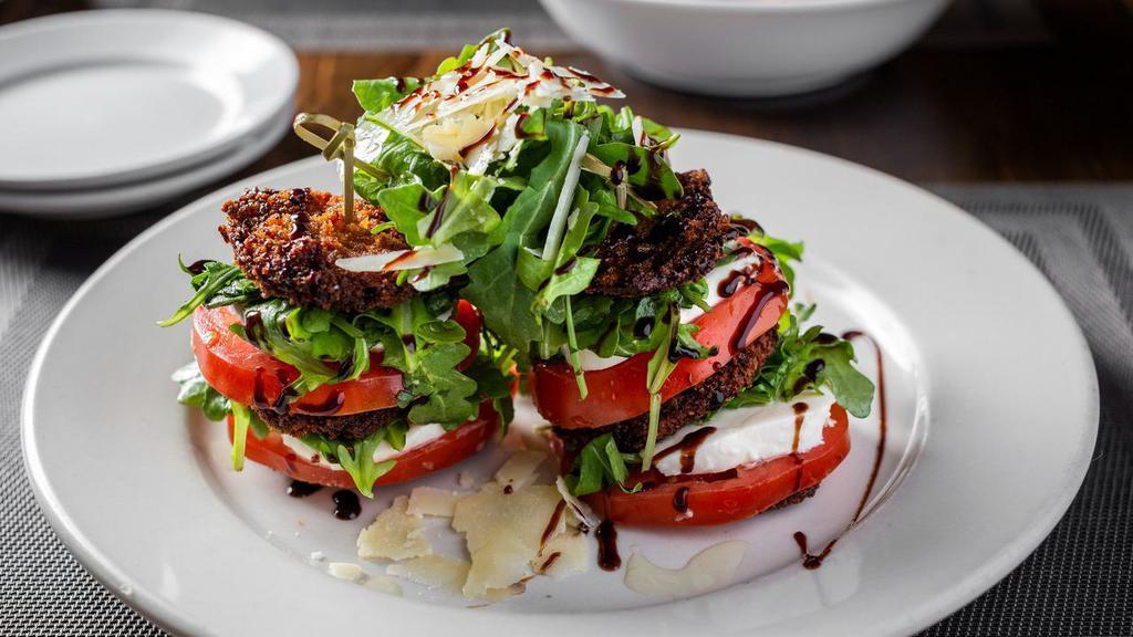 Caprese · Served with Bufala mozzarella, basil, aged balsamic, and extra virgin olive oil. Add crispy eggplant for an additional charge.