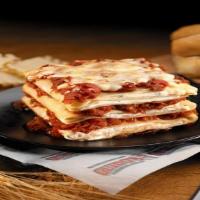 Triple Layer Lasagna · 3 layers of wavy lasagna stuffed with ricotta, mozzarella, parmesan & romano cheese. Then we...