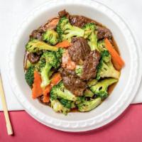 Beef With Broccoli · Stir fried beef with broccoli and carrots in brown sauce.