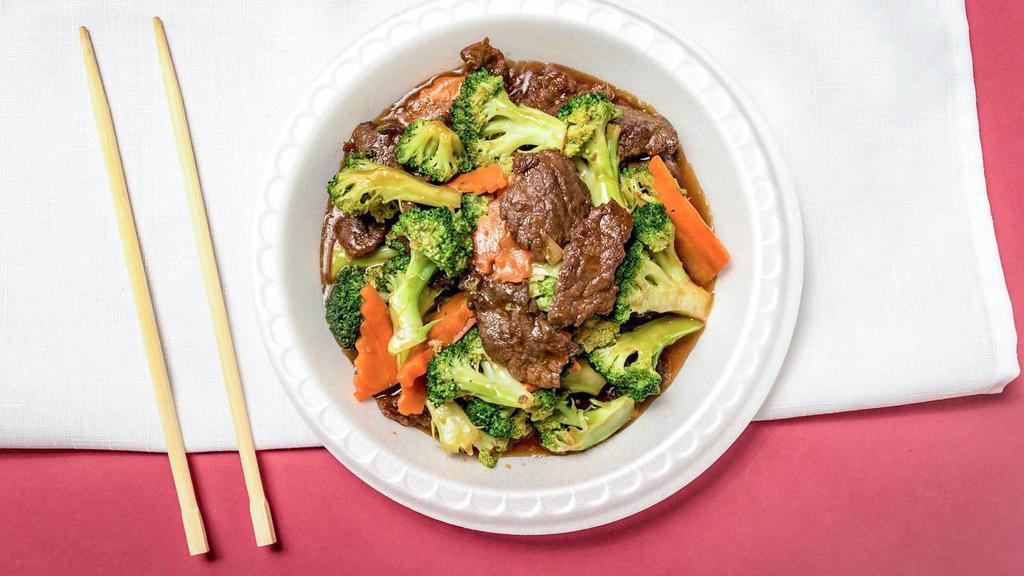 Beef With Broccoli · Stir fried beef with broccoli and carrots in brown sauce.