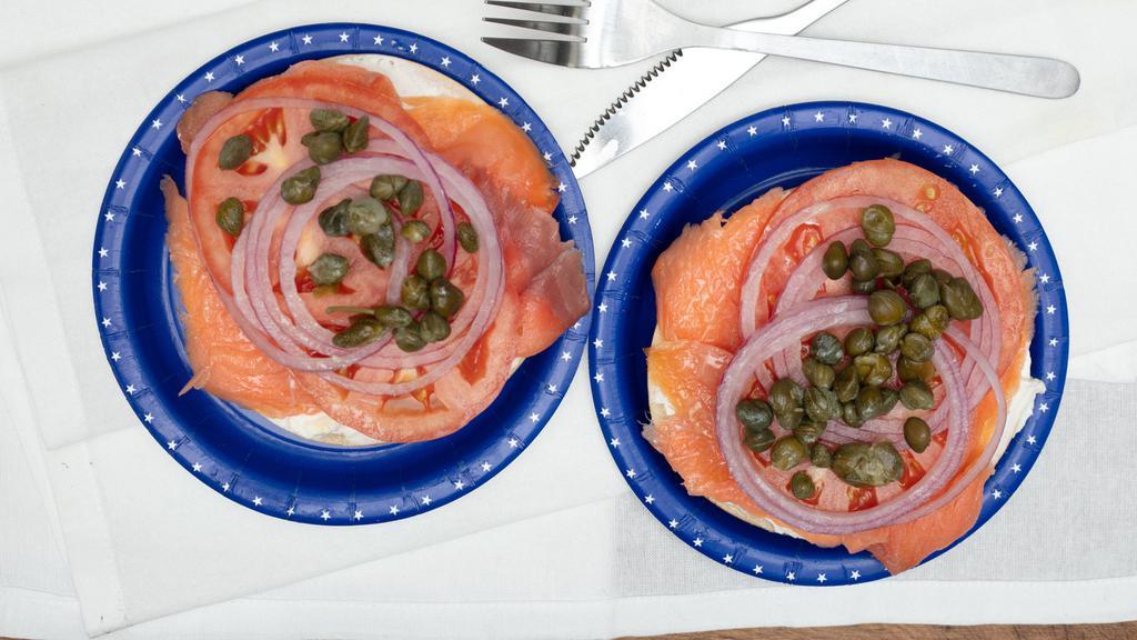 Lox & Cream Cheese · Premium smoked salmon served open face with plain cream cheese, tomato, onion, and capers.