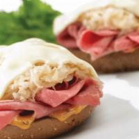 Reuben Melt · Sliced corned beef, topped with Swiss cheese, sauerkraut, and thousand islands.