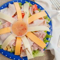 Julienne Salad · Lettuce, tomato, cucumber, onion, turkey, ham, American cheese, Swiss cheese, croutons, hard...