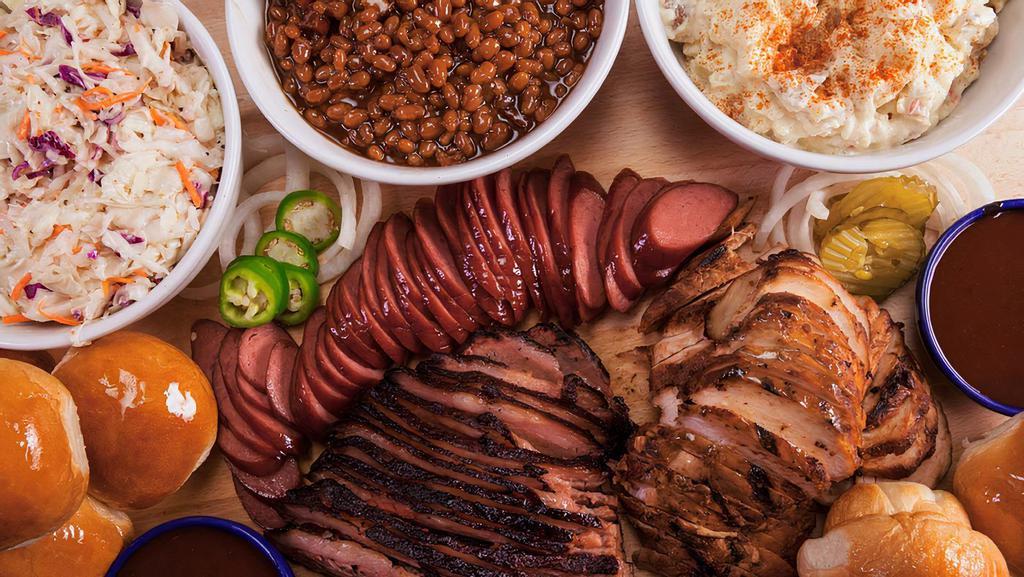 Chuck Wagon Family Supper · Six servings of chicken, six servings of sausage, six servings of brisket, 3 quarts any side, 6 rolls, 2 1/2 pints of bar-b-q sauce. Feeds 'round six.