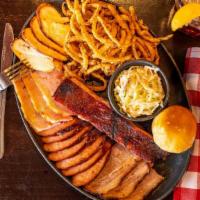 Oklahoma Sampler · Over 1lb of meat! Brisket, sausage, chicken,pulled pork  & a rib. Served with a roll and two...
