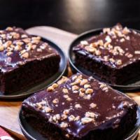 Oklahoma Chocolate Sheetcake · Out of this world. An Oklahoma classic. Our chocolate sheet cake is an oversized bite of cho...