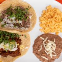 Tacos (2) With Rice & Beans · 2 Tacos with rice and beans on the side
2 Tacos, con arroz y frijoles a lado