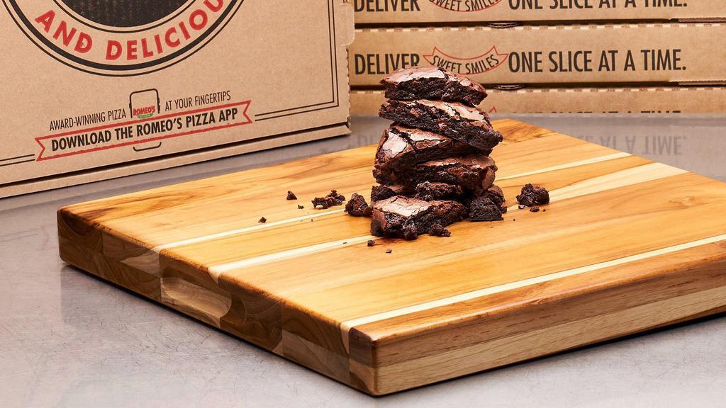 Chocolate Chip Brownie · Family sized chocolate chip brownie, fresh baked, cut into 8 slices and served warm.