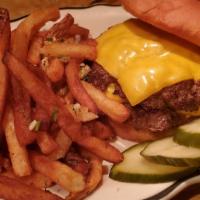 Oklahoma Cheeseburger · Yeehaw! Get ‘em cowboy! Two onion-smashed 1/4 lb beef patties with American cheese, burger s...