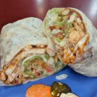 Burritos · Large flour tortilla wrapped with meat and choice of fillings.
