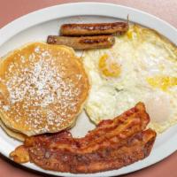 Pancake Combo · Two eggs, two applewood bacon strips, two sausage links and three pancakes. No substitutions.