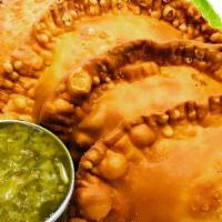 Homemade Empanadas (Each) · All prepared daily and made fresh to order. Choose from ground beef, tinga (shredded chicken...