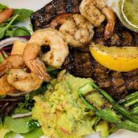 Mar & Tierra · Award winning recipe. Grilled tampiquena style steak and jumbo shrimps with a hint of garlic...
