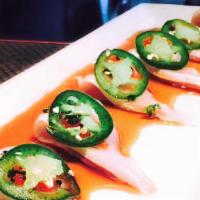 Jalapenos Sashimi · choice of Tuna, Yellowtail, or Salmon topped with jalapeños, sriracha, cilantro and ponzu sa...
