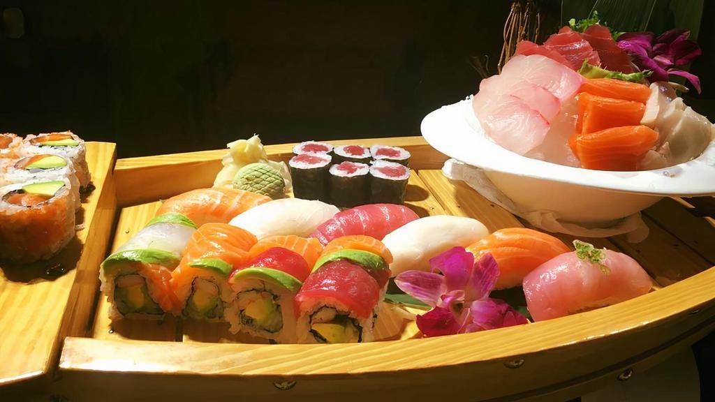 Kims Special Boat · 12 piece nigiri 12 piece sashimi of chefs choice, and your choice of any two.