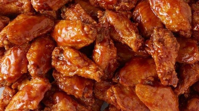 Chicken Wings 25 Pieces (Medium Size) · 25 Medium Size wings fried and smothered in choice of Buffalo, BBQ or Honey BBQ Sauce
