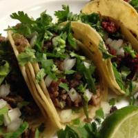 Taco Plate · Three tacos with choice of protein. Served with rice and beans.
