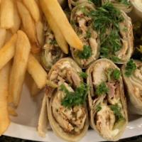 Arabic Mix Shawarma · Beef and chicken shawarma in special bread (call shrakbread) toasted and cuted to pieces, co...