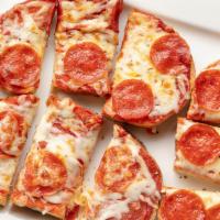 Pepperoni Pizza Bread · Two or four slices of Vienna bread with our own distinctive sauce topped with pepperoni and ...