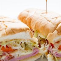 Hot Hoagies (Half) · Our famous toasted Italian sandwich. Toasted bun with melted mozzarella cheese over a lunch ...