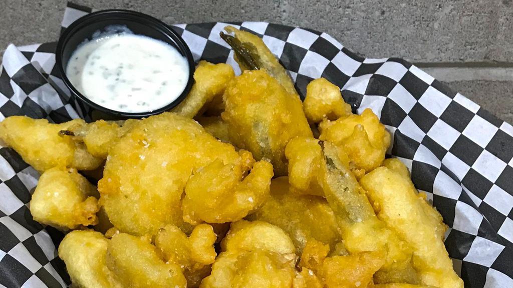 Fried Pickles · Rotating pickled vegetables are dipped in tempura battered and fried to perfection. Our current pickles are sunchokes, Brussels sprouts, sweet peppers and celery root, and are served with a jalapeño jelly.