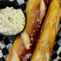 Soft Pretzel · Two soft pretzels served with a fermented mustard seed and cream cheese dip. This dip solves...