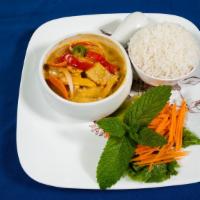 Yellow Curry · Yellow curry paste with coconut milk, meat, tofu, onion, carrots, bell peppers, potatoes.