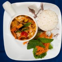 Red Curry · Red curry paste with coconut milk, bamboo shoots, meat, tofu,basil leaves, kaffir and bell p...