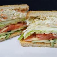Grilled Veggie Sandwich · With cole slaw, swiss cheese, tomato, lettuce, cucumbers, green peppers, and Russian dressing.