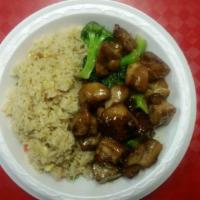Bourbon Chicken · Diced chicken with broccoli in a brown bourbon sauce. Served with white or fried rice.