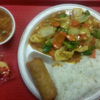 Curry Chicken · Spicy. Sliced chicken with green peppers, onion. and carrots in a spicy curry sauce. Served ...