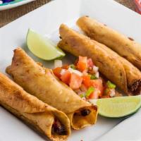 Flautas · Flautas with a choice of meat (Brisket and Chicken) with rice and beans