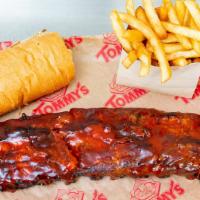 Tommy’S Bbq Baby Back Ribs · Grilled to perfection-smothered in our special sauce, served with fries and garlic bread.
