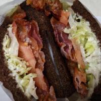 Blt · Bacon, Lettuce, Tomato, and Mayo served on Dark Rye Bread.