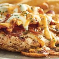 Alice Springs Chicken · Grilled chicken breast topped with sautéed mushrooms, crisp bacon, melted Monterey Jack and ...