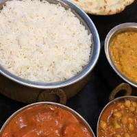 Family Packs For Four  · Chicken Tikka Masala 
Chana Masala 
Daal Tadka 
Basmati Rice 
Two Butter Naan(8 Pieces)