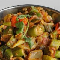 Bhindi Masala · Fresh okra lightly sautéed with onions, spices, tomatoes, and bell peppers.