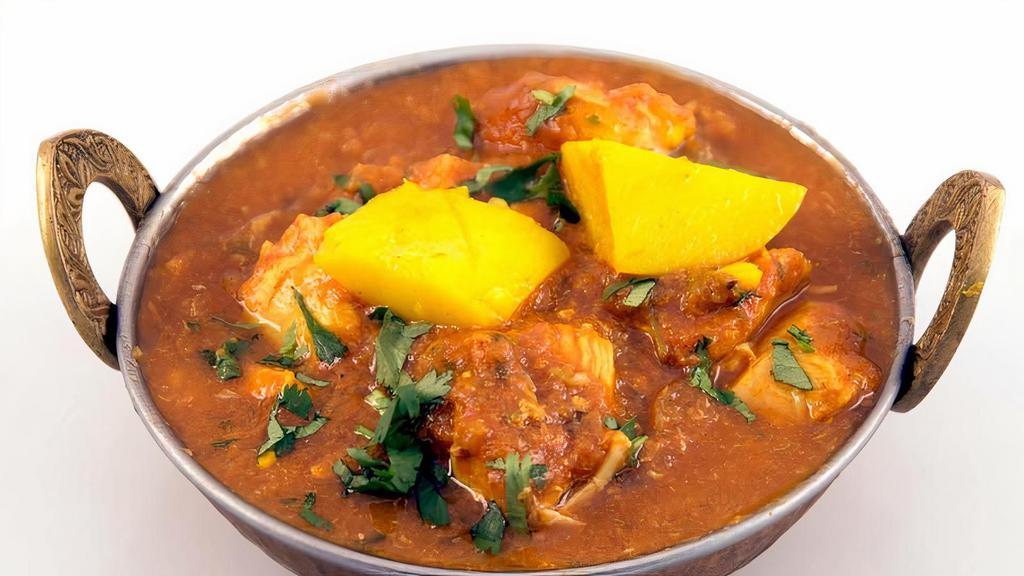 Chicken Vindaloo (Potato) · Boneless, leg meat chicken cooked with potatoes, Indian spices, and vinegar.