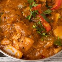 Kadai Chicken · Boneless, Leg meat chicken cooked with, onion, tomato, ginger, garlic, bell peppers, and Ind...
