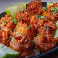 Tandoori Shrimp · Fresh, jumbo shrimp marinated in delicately spiced yogurt and baked on skewers in our tandoo...