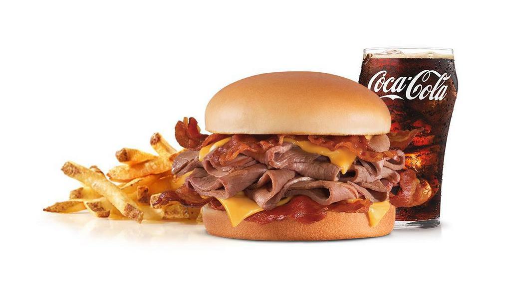 Monster Roast Beef Combo · Sliced roast beef and melted American cheese served on a potato bun. Served with Horseradish or BBQ. Served with Fries and a Beverage.