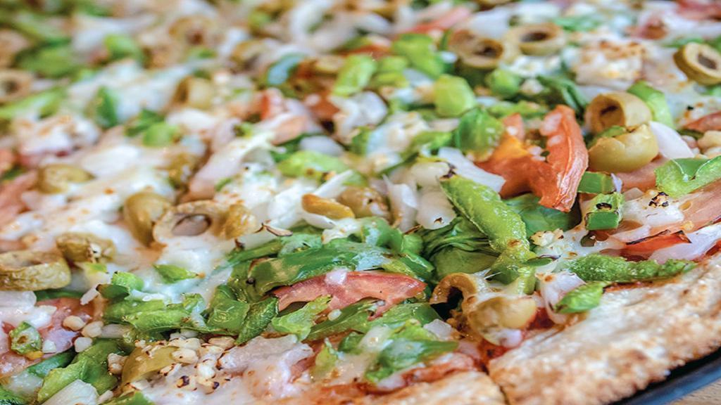 Veggie Max · CLASSIC RED SAUCE, MOZZARELLA & MUENSTER CHEESE, SPINACH, TOMATO SLICES, WHITE ONIONS, GREEN PEPPERS, GREEN OLIVES, CHOPPED GARLIC