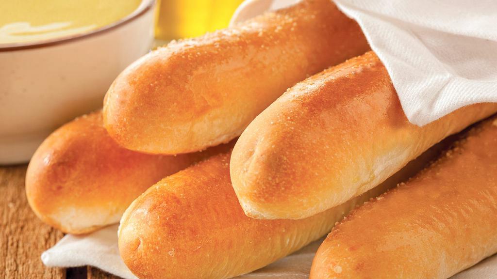 Breadhand-Rolled Breadsticks With Dip · Dips (2 oz.): spicy cheese 90 cal., marinara 35 cal., buttery garlic 50 cal.