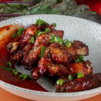 Korean Bbq Wing (Mild Heat) · Spicy. Gochujang BBQ. Scallions.