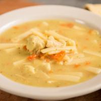 Chicken Noodle Soup · Wide noodles with carrot, onion, celery, and chunks of chicken, all in a flavorful broth.