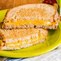 Kids Grilled Cheese · Melted cheddar cheese on grilled whole-wheat bread. Includes a juice box and blueberry apple...