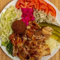 Chicken Shawarma Plate  · Comes with hummus, Jerusalem salad and served on a choice of fries or rice with satziki sauce.