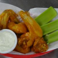 Buffalo Wings · 2 joint chicken wings covered with buffalo sauce and served with celery sticks with your cho...